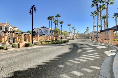 View of asphalt road featuring a residential view,