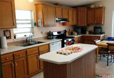 Bright kitchen includes oven/range, dishwasher, di