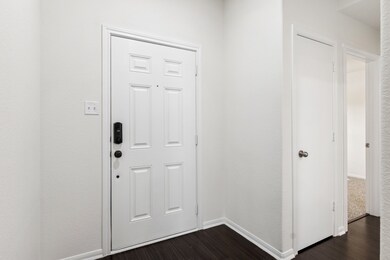 Interior view of front door/hallway