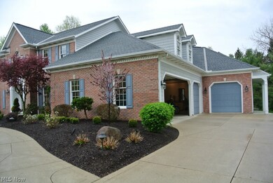 3-car garage with newer 1.5-car Carriage garage addition.