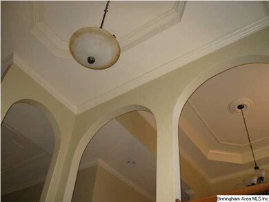 see the Tray Ceiling of the Foyer and Dining Room 