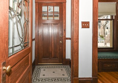 Leaded glass and tiled entry.