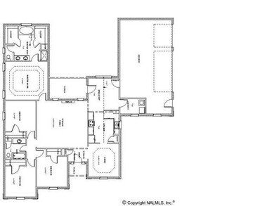 Raleigh Plan D. Plan designed for a corner lot. All brick - 3 car garage.