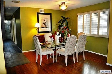 formal dining area offers hardwood floors, shutter