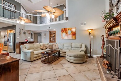 Nice Family Room w/Fireplace; decorative fans and