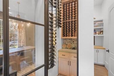 The temperature-controlled wine room ensures your