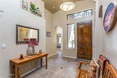 Vaulted ceiling & tiled floor entry!