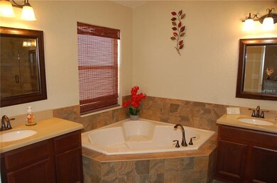 Master Bath, separate his/her's vanities and garde