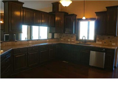 Spacious kitchen with lots of storage.