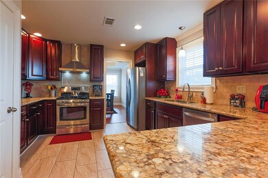 Beautiful open kitchen with stainless appliances