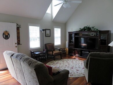 You will love this light filled room with upper dormers acting as skylights.  Beautiful cherry hardwood floors grace the great room.