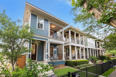 This home is part of an idyllic Heights streetscap
