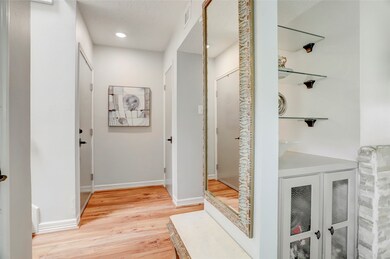 Light and bright entry foyer with handy coat close