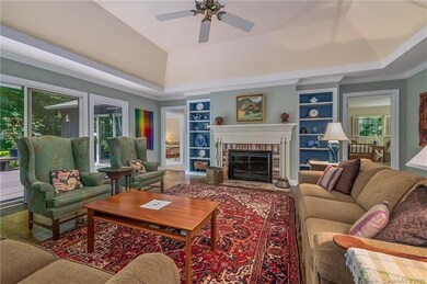 Living Room with wood burning fireplace and slidin