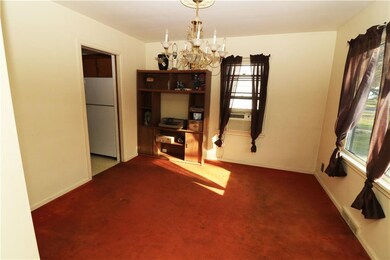 Generous formal dining room with hardwood shown un
