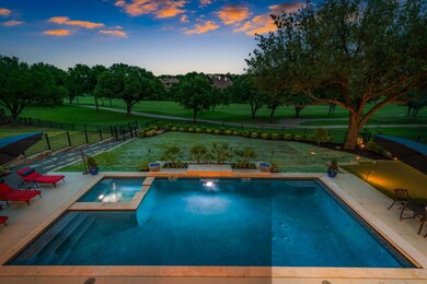 Luxurious pool with spa and outdoor living