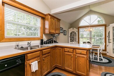 Kitchen has lazy Susan, oak-beveled countertops, p