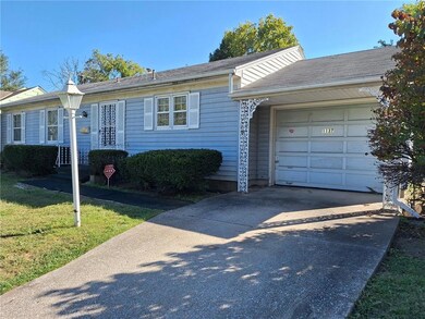 West of front with garage