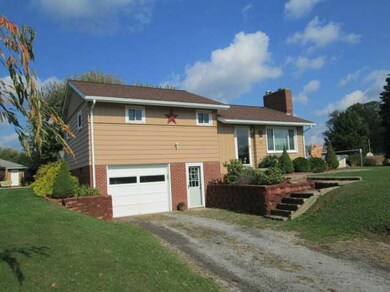 Exterior Front. Newer roof and windows!