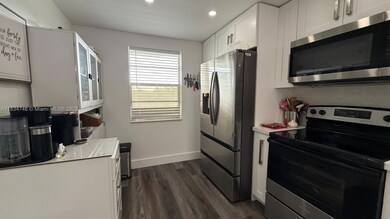 3910 Inverrary Blvd unit B503, Lauderhill, FL 33319 - photo 6