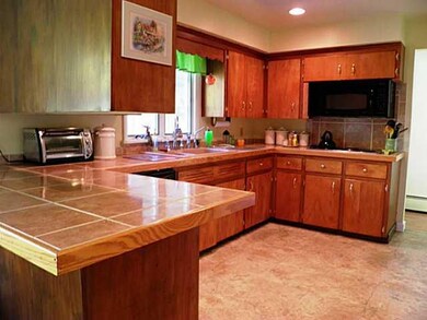 Kitchen. Includes spacious eat-in area.