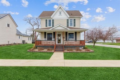 Charming 1 3/4 story, open front porch