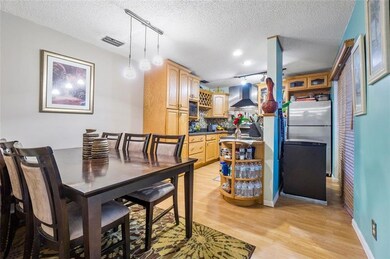 Opens up to Kitchen and Living Room