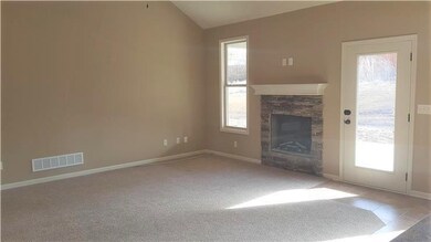 open spacious great room with fireplace walks out 