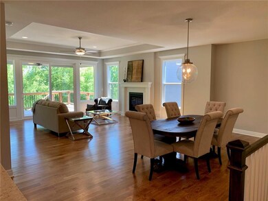 Kitchen overlooks the spacious dining and great ro