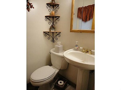 Bathroom 1/2 bath off the front entrance foyer