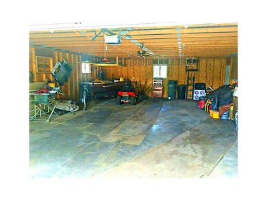 Garage. Four car tandem garage with room to spare!