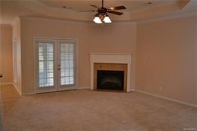 The Great Room features a cozy electric fireplace,