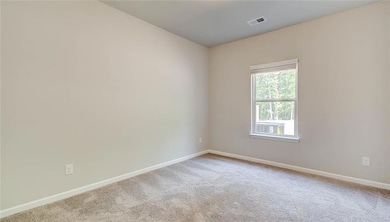 Spare room with carpet