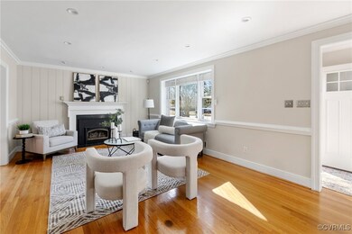 Living room featuring hardwood flooring, fireplace