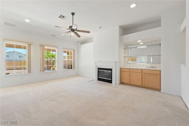 Unfurnished living room featuring light colored ca