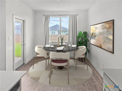 Dining room, staged for illustration.