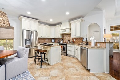 As you enter the kitchen from the dining room you
