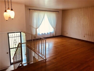 Spacious Double Door Foyer and Large Living Room.