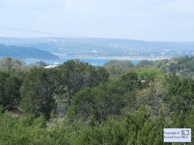 Waterview: 2nd story home with side view of lake and hills.