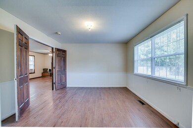 Formal Dining room  opens to den and kitchen.