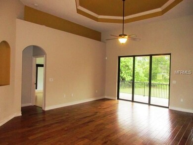 formal living room has built ins, one of them lighted to display your 