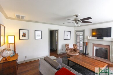Great living space with adorable side porch access