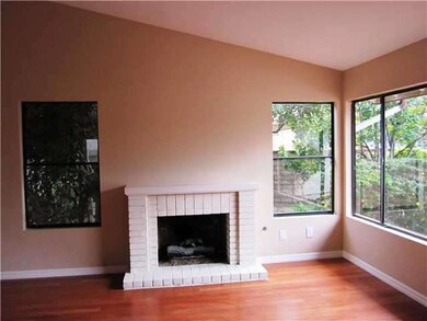 Living/Dining Room features cozy fireplace