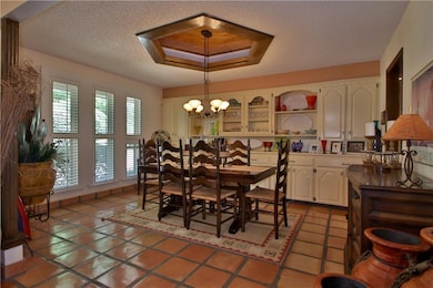 Formal dining room with built-in china hutch, terr