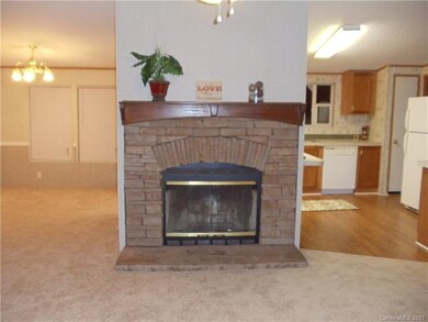 Dining room left and kitchen to the right, this ex