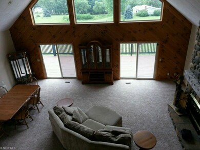 Looking from the loft over the great room