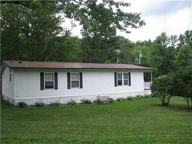 Exterior Front. Corner lot with a large side yard.