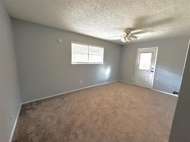Empty room featuring plenty of natural light, ceil