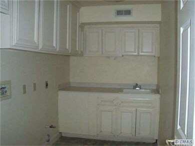 Convenient Downstairs Laundry Room