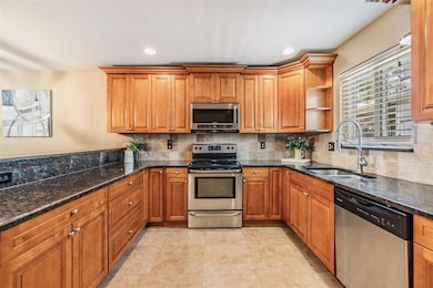 Stainless Steel Appliances, Granite Counter Tops and inset lighting